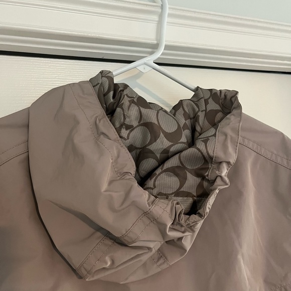 Barely worn Coach rain jacket with signature logo, hood, pockets &cinched waste - Picture 5 of 8